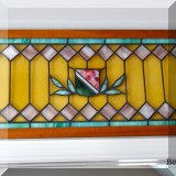 D53. Framed stained glass. Crack in one pane. 21”h x 41”w - $95